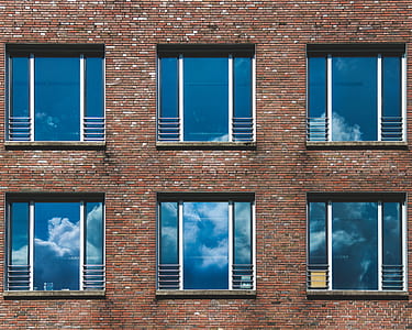 photo of brown painting high-rise building thumbnail