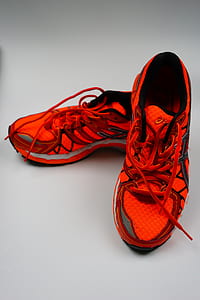 pair of red running shoes thumbnail