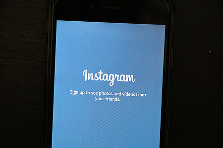 turned-on phone displaying Instagram thumbnail