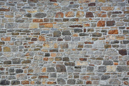 minimalist photography of gray and brown brick wall thumbnail