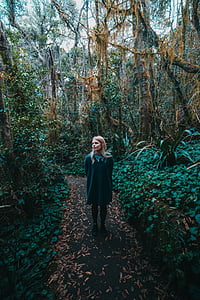 woman wearing green collared long-sleeved dress on forest during daytime thumbnail