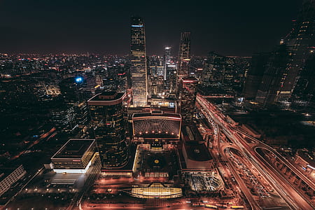 city with high-rise buildings at nighttime thumbnail
