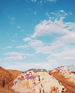 pink and white floral printed rock thumbnail