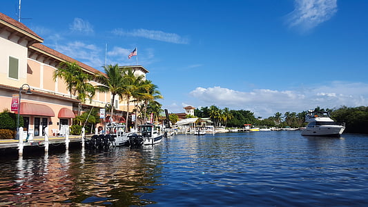 white yacht on body of water during daytime thumbnail