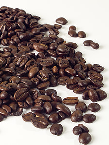roasted coffee beans on white surface thumbnail