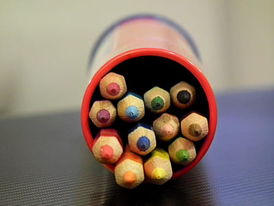 assorted-color coloring pencils in case thumbnail