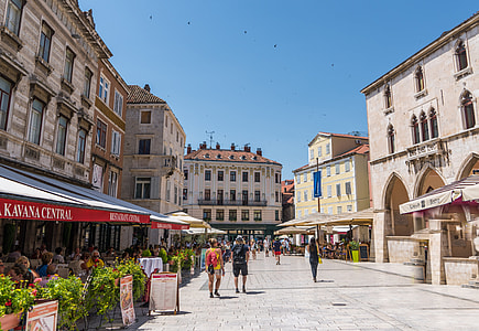 group of people walking on street thumbnail