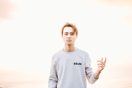 man in gray sweatshirt thumbnail