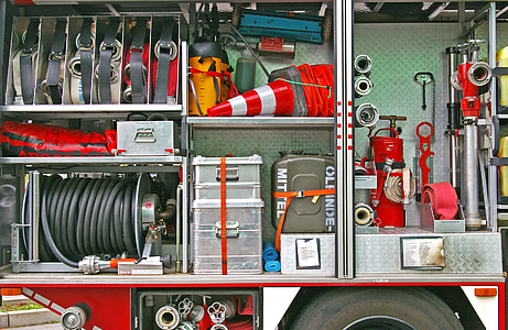 assorted-color firetruck tools inside truck thumbnail