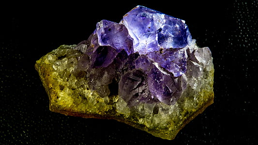 closeup photo of green and purple geode stone thumbnail