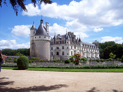 white and gray castle under white and blue cloudy sky thumbnail