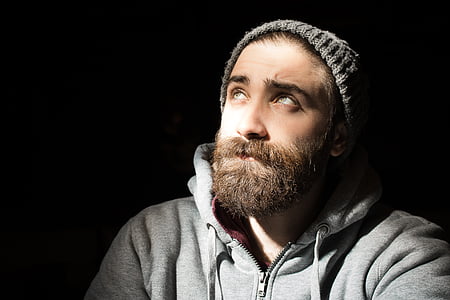 bearded man wearing zip-up hoodie looking up thumbnail