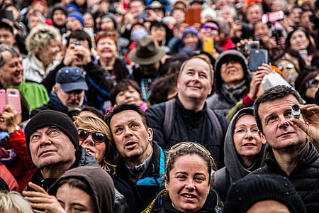 people looking up during daytime thumbnail