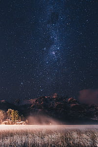 mountains under night sky thumbnail