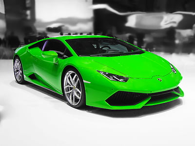 green Lamborghini Huracan on display during car show thumbnail