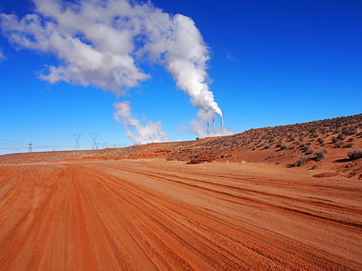 factory on desert field thumbnail