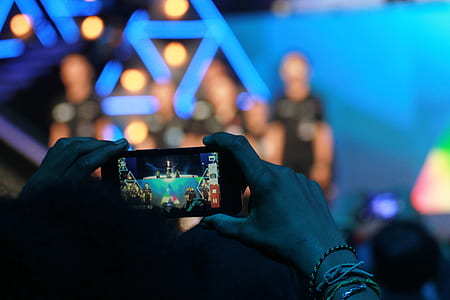 person holding a black Android smartphone thumbnail