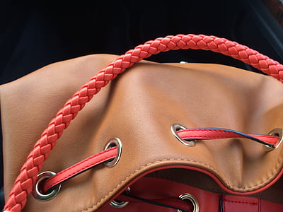 brown leather bag close-up photo thumbnail