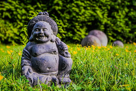 shallow focus photo of gray concrete Hotei decor thumbnail