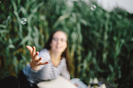 Having fun with soap bubbles in the nature thumbnail