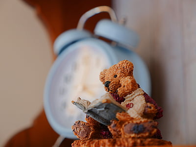 white and red ceramic figurine thumbnail