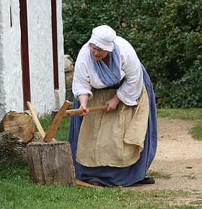 woman axing wood thumbnail