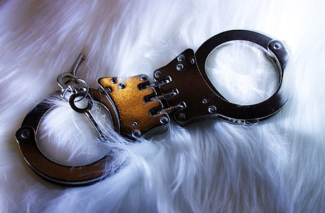 gold and silver handcuffs with keys thumbnail