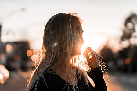 woman standing under white sky thumbnail