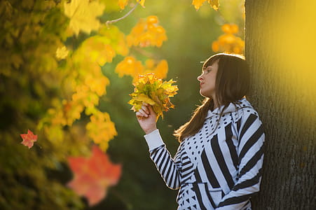Woman Holding Leaves thumbnail