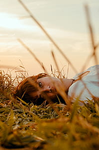 Woman Laying on the Grass thumbnail