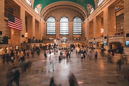 people roaming around a train station thumbnail