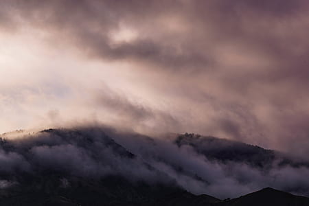 silhouette of mountain under sky thumbnail