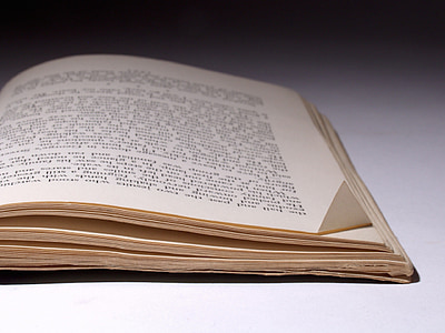 brown and black book on white top thumbnail