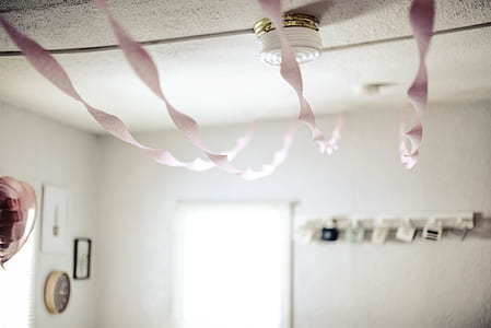 shallow focus photo of white hanging decor thumbnail