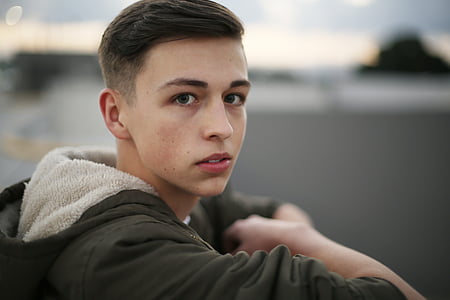 man in gray and white hooded jacket thumbnail