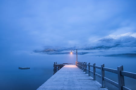 wooden dock near body of water thumbnail