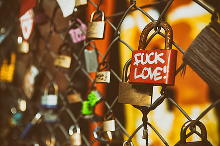 Close-up shot of padlocks on a fence in East London thumbnail