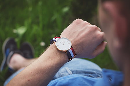 man looking at his watch displaying 2:05 thumbnail