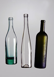 three assorted-color bottles thumbnail