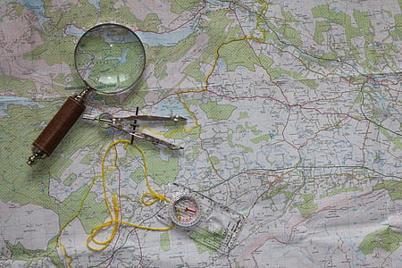 photo of magnifying glass and ruler on map thumbnail