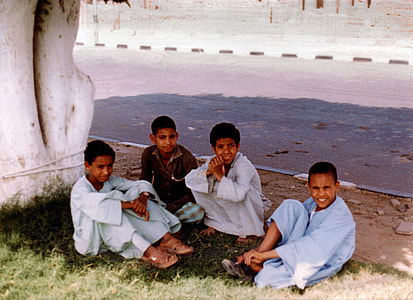 Children Sitting on the ground at Luxor, Egypt thumbnail