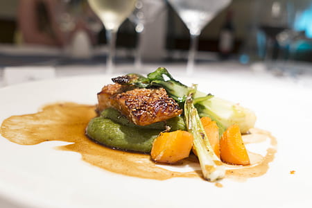 fried dish with vegetables on white plate thumbnail