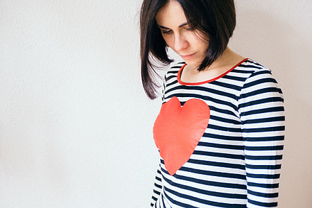 Girl with a heart on her shirt thumbnail