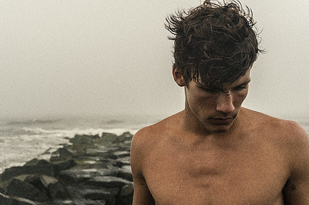 person beside body of water thumbnail