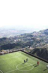 soccer player playing on soccer field thumbnail