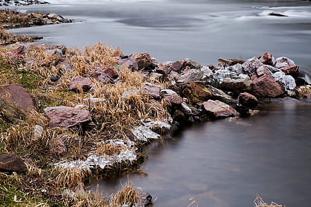 rocks near body of water thumbnail