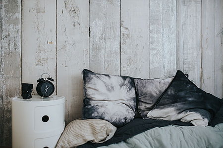 Collection of grey and white pillows thumbnail