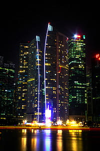 Photo Of High-rise Buildings During Night Time thumbnail