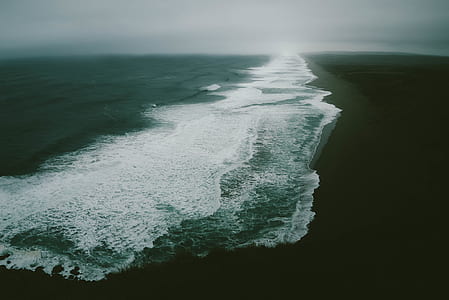 high angle photography of shore during daytime thumbnail