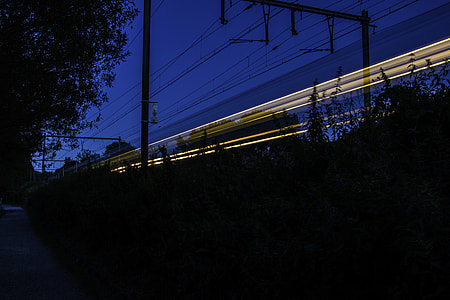 time lapse photography of vehicle passin thumbnail